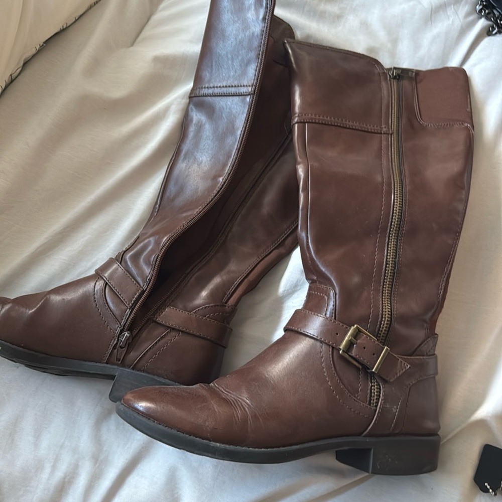 Brown boots, below knee
